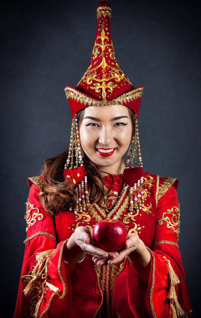 Kazakh women with red apple